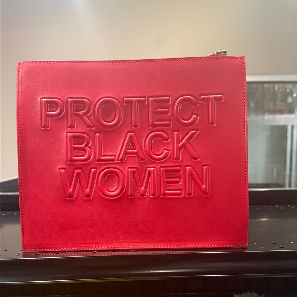 Red Embossed Statement Clutch